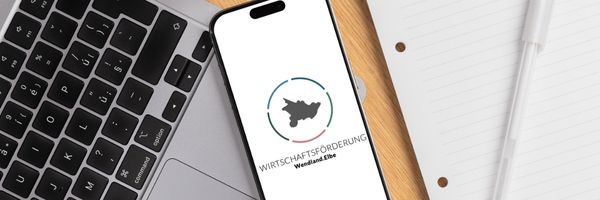 Handy mit Wirtschaftsförderungslogo, CANVA Mockup
